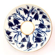 Load image into Gallery viewer, Elegant porcelain tea cup and saucer, hand painted with blue bell flowers with gold details (design 1744). Produced by Russian Imperial Lomonosov in St. Petersbourg, Russia.  In excellent condition, free from chips/cracks/wear. Makers marks on the bottom of each piece.  Tea cup measures 3-1/2&quot; x 2-7/8&quot; and the saucer measures 5-3/4&quot;

