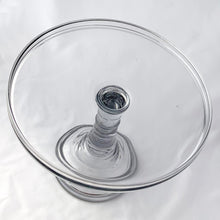 Load image into Gallery viewer, This is a vintage victorian style pressed glass cake stand, circa early 1900s. This cake plate features a nicely shaped pedestal and modern elegant design with a rum rimmed plate. It&#39;s perfect for serving cake, cupcakes or your favourite dessert! This would be a perfect service piece for any occasion, including a wedding buffet. Or repurpose as a display piece.  Excellent condition, no chips or cracks.  Measures 11 x 8 1/4 inches
