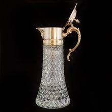 Load image into Gallery viewer, Vintage honeycomb patterned pressed glass wine carafe with a beautifully ornate art nouveau style silver-plated hinged and handled lid with ice chamber insert. A stunning piece of mid-century craftsmanship by F.B. Rogers Silver Co.  The glass and insert are excellent condition, free from chips/cracks. The silver has some minor discolouration.  Measures 14&quot; tall.
