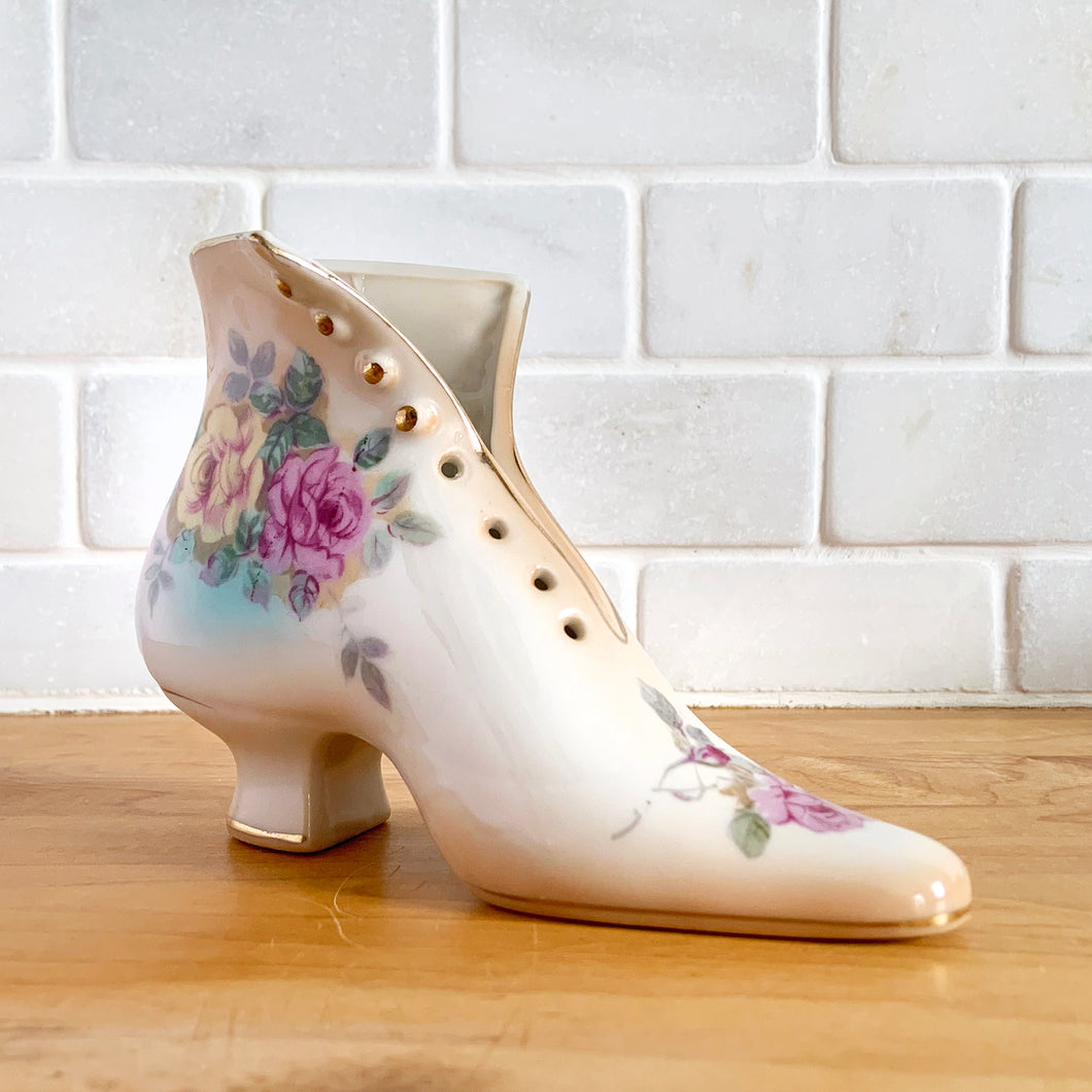 Vintage Victorian style white porcelain boot or high sided shoe with pink and yellow roses with gold trim. Produced by RS Prussia.  In excellent condition, free from chips/cracks/repairs.  Dimensions: 6