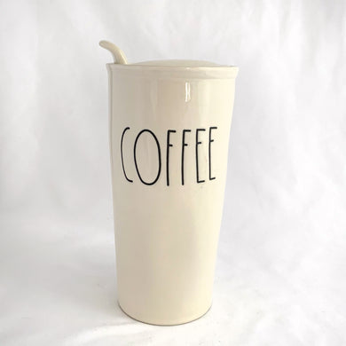 Authentic Rae Dunn Artisan Collection ceramic COFFEE travel tumbler. Crafted by Magenta 214. Perfect for those long commutes or country drives.  In excellent condition, no chips or cracks.  Measures 3 1/2 x 6 1/4 inches