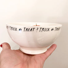 Load image into Gallery viewer, Rae Dunn Artisan Collection &quot;Trick or Treat?&quot; with pumpkin on the interior. Produced by Magenta. A great addition to your Halloween decor!  In excellent condition, free from chips/cracks.  Measures 7 x 3 inches
