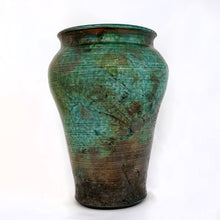 Load image into Gallery viewer, Striking vintage pottery vase in tones of green and copper and fired using the Raku process. Raku is a Japanese method of pottery making dating back to the 1500s. The clay object is removed from the kiln at the height of firing which causes it to cool very quickly causes unusual results and it&#39;s signature black clay. This piece is signed on the bottom &quot;Pat Patterson Waterdown&quot;.  In excellent condition, free from chips/cracks.  Measures 5 1/2 x 8 1/2 inches
