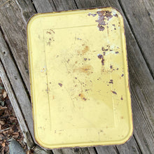 Load image into Gallery viewer, mid-century vintage red, black and yellow plaid metal picnic basket. Perfect for storing crafts, use as a display piece or as intended and enjoy a lovey picnic. GSW is punched into the sidewall of the basket. Produced by General Steel Wares, circa 1950. GSW is a Canadian company founded in the mid 1800s still in operation today. In fair vintage condition with wear and rust spots, handles are solid, a small hole in the bottom. This basket measures 13&quot; x 9 1/2” x 8 1/2&quot;
