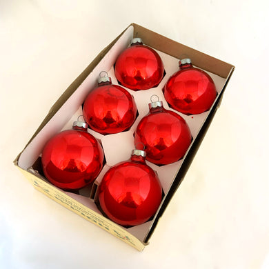 Boxed set of vintage red glass ball Christmas ornaments. Produced by Holly Decorations Inc. USA circa 1970/80s  In good vintage condition.  Measures 2-1/2