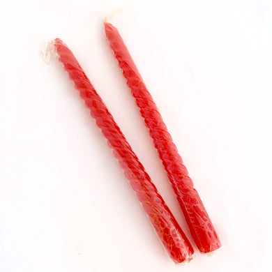 This vintage pair of red spiral taper wax candles is a perfect statement piece for any home. In good, vintage condition with original cellophane intact, each measures 10