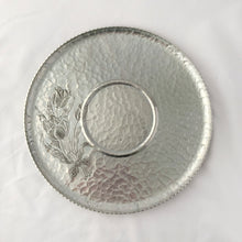 Load image into Gallery viewer, Beautiful hammered aluminum serving tray with embossed tulip design on shape #460. Crafted by Rodney Kent in Brooklyn, New York USA, circa 1950s. This tray would look stunning on a bar cart or pair with a bowl for serving appetizers with dip. In excellent condition. Makers mark on bottom. Measures 11 1/4 x 1/2 inches
