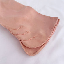 Load image into Gallery viewer, TV and movie prop stylists. Never worn, vintage mid-century rose pink cotton gloves with scalloped detail above the split cuff. Impeccable workmanship. Produced in Czechoslovakia, circa 1950s. Perfect for everyday, a special occasion, or costume styling. In new condition. Original makers tag and Eatons price tag Toronto department store no longer in business. Label states size 6 1/2.  Measures 3 inches at the widest part of the hand, 4 1/2 inches at the cuff and 10 5/8 inches in length.
