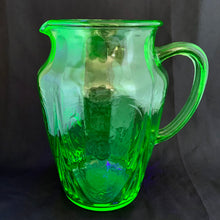 Load image into Gallery viewer, HIghly collectible green uranium depression glass handled pitcher in the &quot;Royal Lace&quot; pattern. Fluoresces and glows beautifully under black light . Produced by Hazel-Atlas Glass, between 1934 - 1941.  Dimensions: 8&quot;  Capacity: 64 Oz

