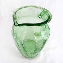 Load image into Gallery viewer, HIghly collectible green uranium depression glass handled pitcher in the &quot;Royal Lace&quot; pattern. Fluoresces and glows beautifully under black light . Produced by Hazel-Atlas Glass, between 1934 - 1941.  Dimensions: 8&quot;  Capacity: 64 Oz
