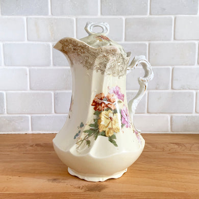 Beautiful vintage white porcelain coffee pot, over glazed in yellow with pink, red and purple flowers and detailed transferred gold pattern. Marked 502/7461 ROYAL SAXE E.S. GERMANY.  In good used vintage condition, chip to the underside of spout, no cracks and some loss of the gold on the lid.  Dimensions: 5