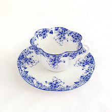 Load image into Gallery viewer, Absolutely stunning vintage bone china &quot;Dainty Blue&quot; tea cup and saucer. Produced by Shelley in England between 1938.  In excellent vintage condition, free from chips/cracks/crazing. Appears to be unused.  Tea cup measures 3-3-8&quot; x 2-1/4&quot; | marked &quot;051/28&quot;  Saucer measures 5-1/2&quot; | marked &quot;051/28&quot;
