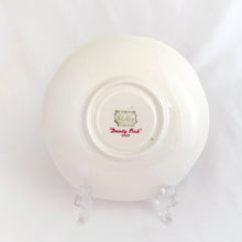 Load image into Gallery viewer, Absolutely stunning vintage bone china &quot;Dainty Pink&quot; tea cup and saucer. Produced by Shelley in England between 1938.  In excellent vintage condition, free from chips/cracks/crazing. Appears to be unused.  Tea cup measures 3-3-8&quot; x 2-1/4&quot; | marked &quot;051/P&quot;  Saucer measures 5-1/2&quot; | marked &quot;051/P&quot;
