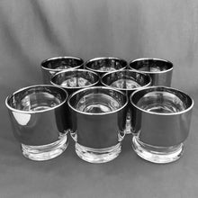 Load image into Gallery viewer, Mid-century vintage silver sided whisky cocktail glasses are perfect for any occasion. Set of four. Decorated with a silver sides and clear base. These will certainly add some vintage glamour to your bar cart!   In excellent condition, no chips or cracks.  Size: 2-3/4&quot; x 2-3/4&quot;
