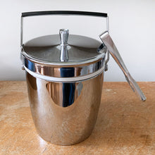 Load image into Gallery viewer, This vintage chrome (over stainless steel) insulated ice bucket and tongs are brand spanking new in box! Produced by Tiger Products Co. Ltd. in Japan, circa 1960s (no barcode on box indicates production prior to 1970).  New in box. In excellent condition.  Measures Stands 6&quot; x 8-3/4&quot; (with handle up 9-1/2&quot;), tongs 6&quot;   3-1/2 cup capacity
