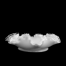 Load image into Gallery viewer, Vintage ruffle and crimped edged &quot;Bon Bon&quot; milk glass dish. The distinct style of the Silvercrest line is a milk glass base with a clear edge. Produced by the Fenton Art Glass Company between 1941 - 1986. This would make a fantastic piece to use as a candy dish or catchall.  In excellent condition, free from chips, cracks or wear.  Measures 7-3/4&quot; x 2-1/8&quot;
