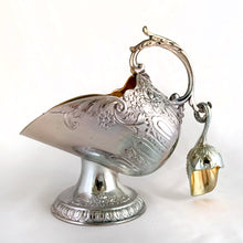 Load image into Gallery viewer, This vintage silver plated sugar scuttle and scoop set, embossed with roses, flowers, leaves and scroll details No 540. It&#39;s just a beautiful vessel for sugar cubes or bath salts. Produced by Leonard Manufacturing Ltd. in Japan.  In good vintage condition. In original box.  Measures approx. 6-1/4&quot; x 3.5&quot; x 6&quot;
