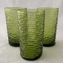 Load image into Gallery viewer, Vintage pressed glass avocado green &quot;Soreno&quot; highball glass tumbler. A great colour with a textured bark-like surface to add to your tableware. Produced by Anchor Hocking  between 1966–1970.  In excellent condition, no chips or cracks.  Measures 2-3/4&quot; x 5&quot;
