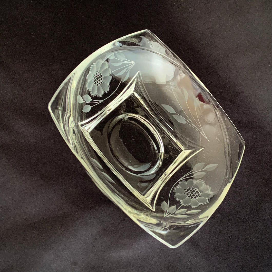 A vintage mid-century rounded edge clear glass candy dish, beautifully cut with two sets of WJ Hughes 12-petalled 