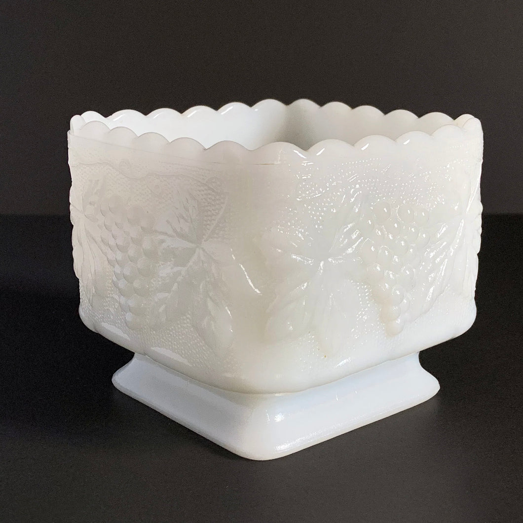 Vintage square white milk glass footed planter in their lovely 'Grape and Leaf' pattern. Produced by the Westmoreland Glass Company, circa 1960s. Perfect for cottage, farmhouse, shabby chic or wedding decor.  In excellent condition, no chips or cracks.  Size: 4.5