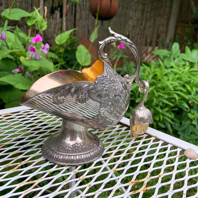This vintage silver plated sugar scuttle and scoop set, embossed with roses, flowers, leaves and scroll details No 540. It's just a beautiful vessel for sugar cubes or bath salts. Produced by Leonard Silver, Japan.  In good vintage condition. Unmarked.  Measures approximately 6 1/4 x 3 1/2 x 6 inches