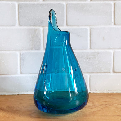 Sweet vintage hand blown teal blue art glass swung vase with bubbles of varying size, polished bottom. Signed by the artist, Kathy Wood, 1989.  In excellent condition, free form chips/cracks.  Measures 3-1/2