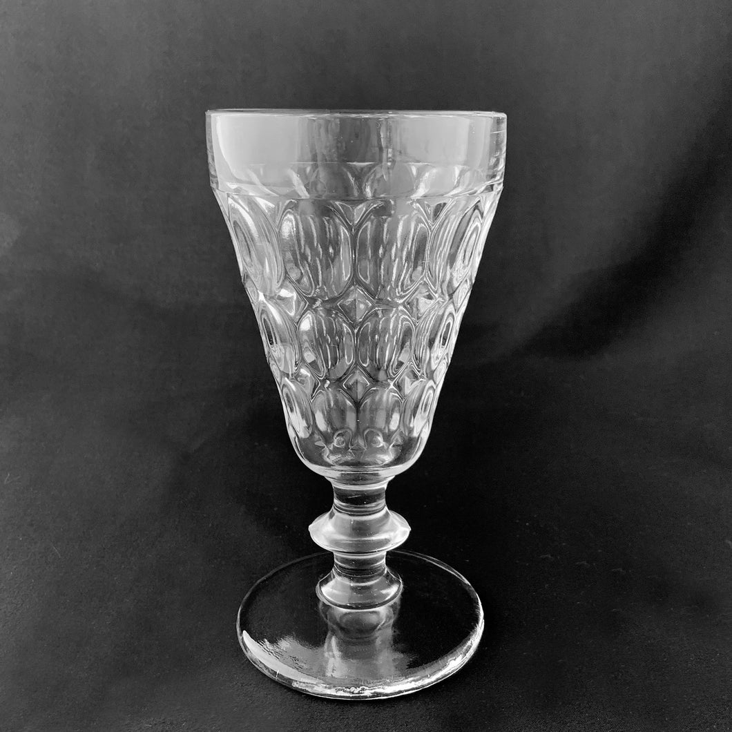Vintage Thumbprint Clear Water Goblet Jeannette Glass Co. USA Beverage Glasses Kitchen Kitchenware Tableware Breakfast Brunch Lunch Dinner Cocktails Party Entertaining Special Occasion Home Decor Boho Bohemian Shabby Chic Cottage Farmhouse Mid-Century Modern Retro Flea Market Style Unique Sustainable Gift Antique Prop GTA Hamilton Toronto Canada shop store community seller reseller vendor