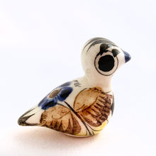 Load image into Gallery viewer, Beautiful Mexican Tonala miniature folk art pottery duck bird figurine. This hand painted figurine is white with a nicely detailed face in black and blue with the body in yellow, blue and brown florals. Signed &quot;MEX&quot;.  In excellent condition, no chips or cracks.  Measures approximately 1&quot; x 1-1/2&quot; x 1-1/4&quot; tall
