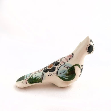 Beautiful Mexican Tonala miniature folk art pottery partridge bird figurine. The hand painted bird is white with a nicely detailed face in black and tan with the back in  blue, pink and green  florals. Signed 