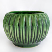 Load image into Gallery viewer, Front view of a vintage forest green McCoy Pottery ribbed round planter.

