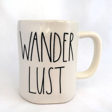 Load image into Gallery viewer, An  oversized 16oz authentic Rae Dunn Artisan Collection mug with the word  &quot;WANDERLUST&quot; in their distinct font. Produced by Magenta.  In mint condition.  Measures 5&quot; x 4.5&quot; (includes handle)  Capacity 20oz
