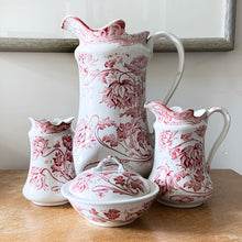 Load image into Gallery viewer, Excited to bring this stunning antique white ironstone &quot;TOGO&quot; floral patterned  red transferware set. Includes large basin/bowl, large and small pitcher, 3-piece soap dish and toothbrush holder. Produced by Colonial Pottery in Stoke-on-Trent, England, between 1890-1925 based on the makers mark.  The set is in excellent condition, free from chips/cracks. Normal crazing present.  Approximate sizes:  Large pitcher 14&quot; Bowl 16&quot; Small pitcher 6&quot; Toothbrush holder 5&quot; Soap dish 4&quot;
