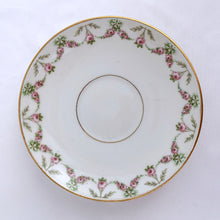Load image into Gallery viewer, Pretty white porcelain demitasse cup and saucer hand painted with pink and green floral swags with gold trim. Produced by L. Bernardaud &amp; Co., Limoges, France for Birks.  Tiniest of flea nicks on one cup. Remaining pieces are in excellent condition, free from chips/cracks/repairs.  Dimensions of cups 2-3/8&quot; x 2-1/8&quot; and saucers 4-5/8&quot;
