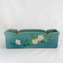Load image into Gallery viewer, Stunning vintage turquoise blue &quot;White Rose&quot; rectangular window box planter, shape 382-9. Produced by Roseville Pottery USA, circa 1940.  In good vintage condition, chips to one corner, crazing present, otherwise lovely condition.  Measures 9&quot;Stunning vintage turquoise blue &quot;White Rose&quot; rectangular window box planter, shape 382-9. Produced by Roseville Pottery USA, circa 1940.  In good vintage condition, chips to one corner, crazing present, otherwise lovely condition.  Measures 9&quot;
