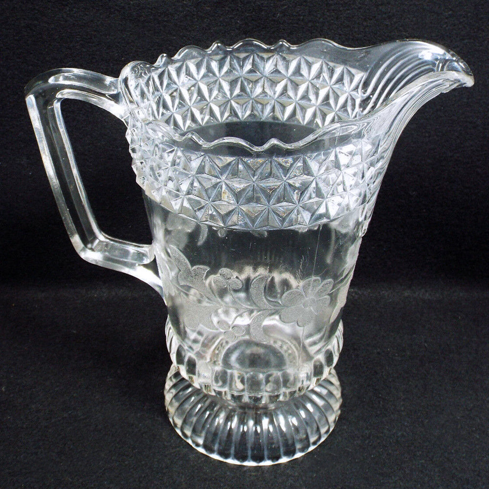 We are thrilled to have this beautiful antique EAPG clear pressed glass footed pitcher, made by Adams & Co., circa 1880. The pattern is called 