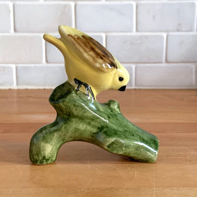 Pretty set of hand painted vintage ceramic yellow birds perched on green branches. I believe this is a Laysan or Hawaiian Finch. Marked with an 'R' on the bottom.  Excellent condition, no chips or cracks.  Bird A: 4