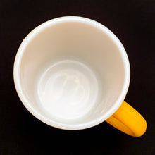 Load image into Gallery viewer, Vintage orange peel texture milk glass C handle mug in sunshine yellow! Produced by Hazel-Atlas Glass, circa 1960s.  In excellent condition, free from chips/cracks.  Measures 3&quot; x 3-1/4&quot;
