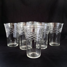 Load image into Gallery viewer, Lovely antique &quot;621 Clear&quot; flat tumblers with ribbed sides and embossed crisscross bands on a classic flared shape. Crafted by Anchor Hocking, USA, circa 1920s. Perfect for adding vintage charm to your drinkware.  In excellent condition, free from chips.  Measures 2 5/8 x 3 3/4 inches
