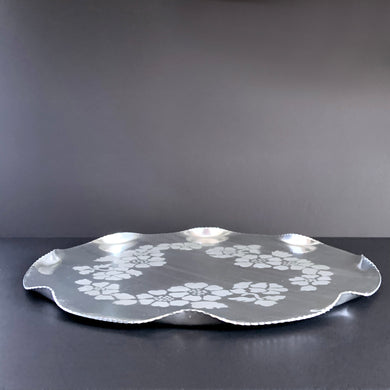 Vintage mid-century round aluminum tray in the 