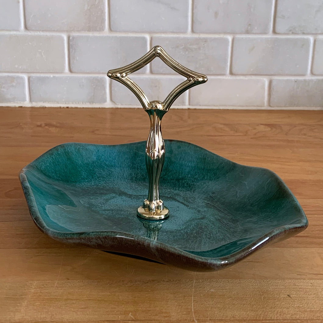 Vintage green drip glaze handled tray. Crafted by Blue Mountain Pottery, circa 1970s. Perfect for serving chocolates, candies or appetizers! Excellent condition, no chips or cracks. Measures 9 x 7 1/2 x 6 inches