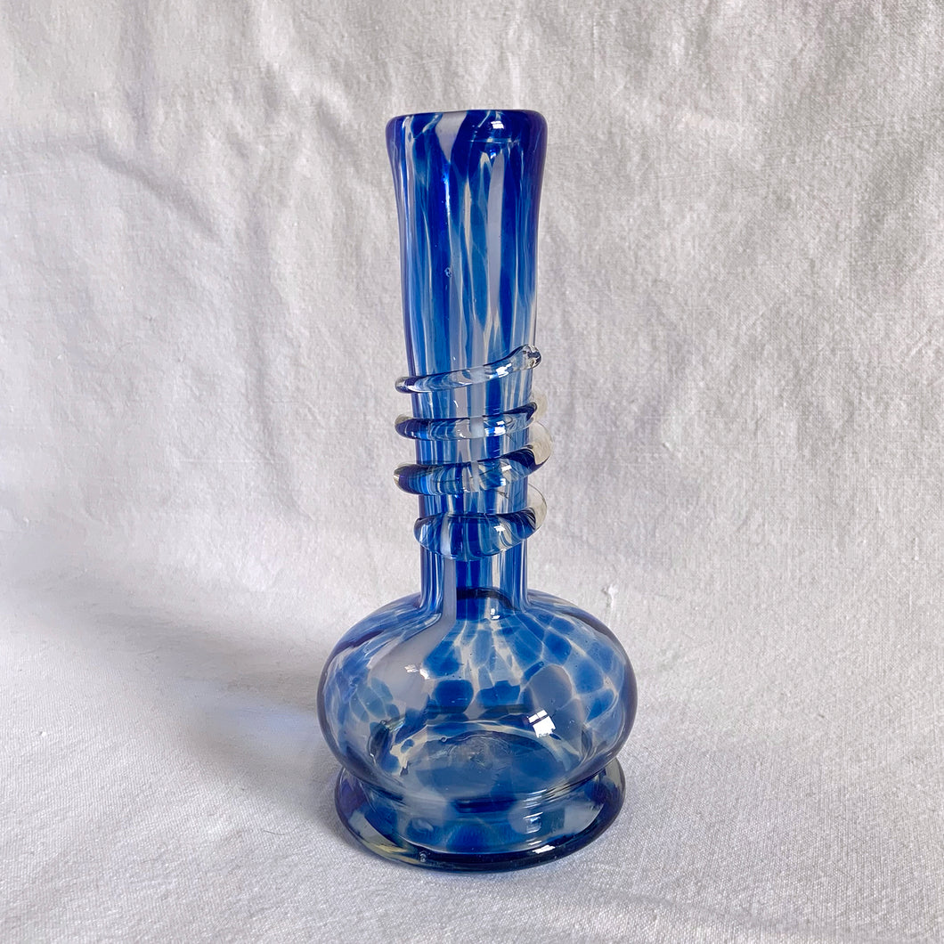 An outstanding hand blown vintage Murano art glass vase in blue, white and clear glass with a spiral detail around the throat of the vessel. Polished pontil. Made in Italy.  In excellent condition, no chips or cracks.  Measures 4 x 8 1/4 inches