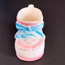Load image into Gallery viewer, Vintage Rubens Originals white baby bootie planter with blue bows and pink details. A perfect addition to nursery decor!  Marked on the bottom with Rubens Originals stamp and sticker, made in Japan.  Excellent condition, no chips or cracks.  Size: 4&quot; x 2.25&quot; x 2.5&quot;
