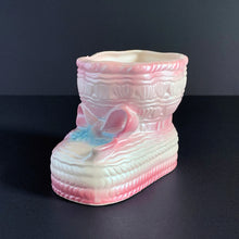 Load image into Gallery viewer, Vintage white lustreware baby bootie planter with pink bows and edge details, and a hint of blue. This would so adorable in a nursery either with a plant, succulent or use it to store/display baby accessories!  Marked on the bottom with Rubens Originals symbol and Japan.  In excellent condition, no chips or cracks.  Measures 4 x 4 x 3 inches
