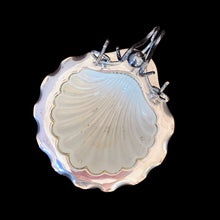 Load image into Gallery viewer, Antique shell-shaped silver plated butter dish with satin glass insert, bun feet and its raised scrolled rest is meant to hold a butter knife. What a special decorative dish to add a hint of elegance to your dining table.

Impressed hallmark EPNS ENGLAND the number 5 and an indiscernible curved mark, circa 1912.

In as found condition, no chips on the glass insert.

Measures 5 1/2 x 6 x 4 1/2 inches
