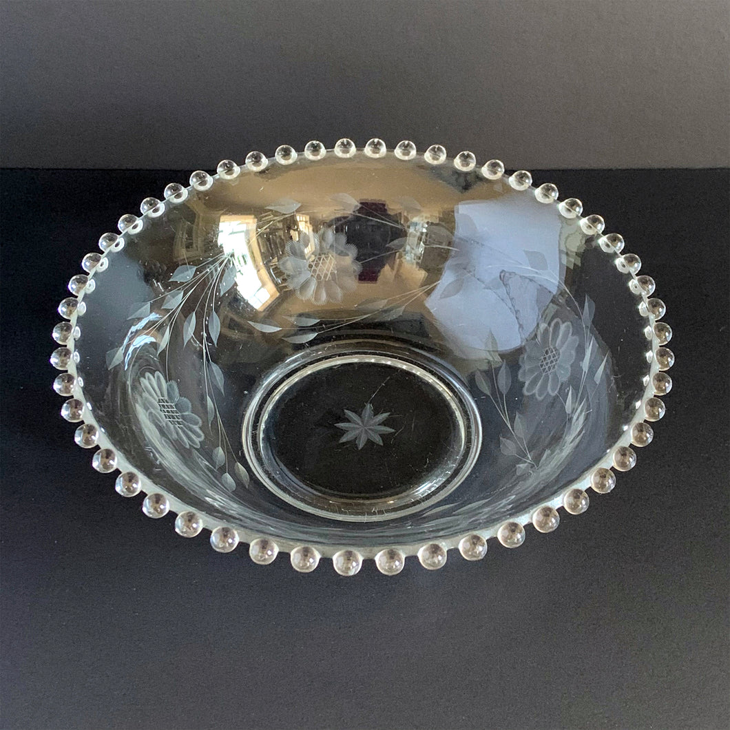 An elegant vintage Imperial Candlewick crystal serving bowl cut with WJ Hughes twleve-petalled 
