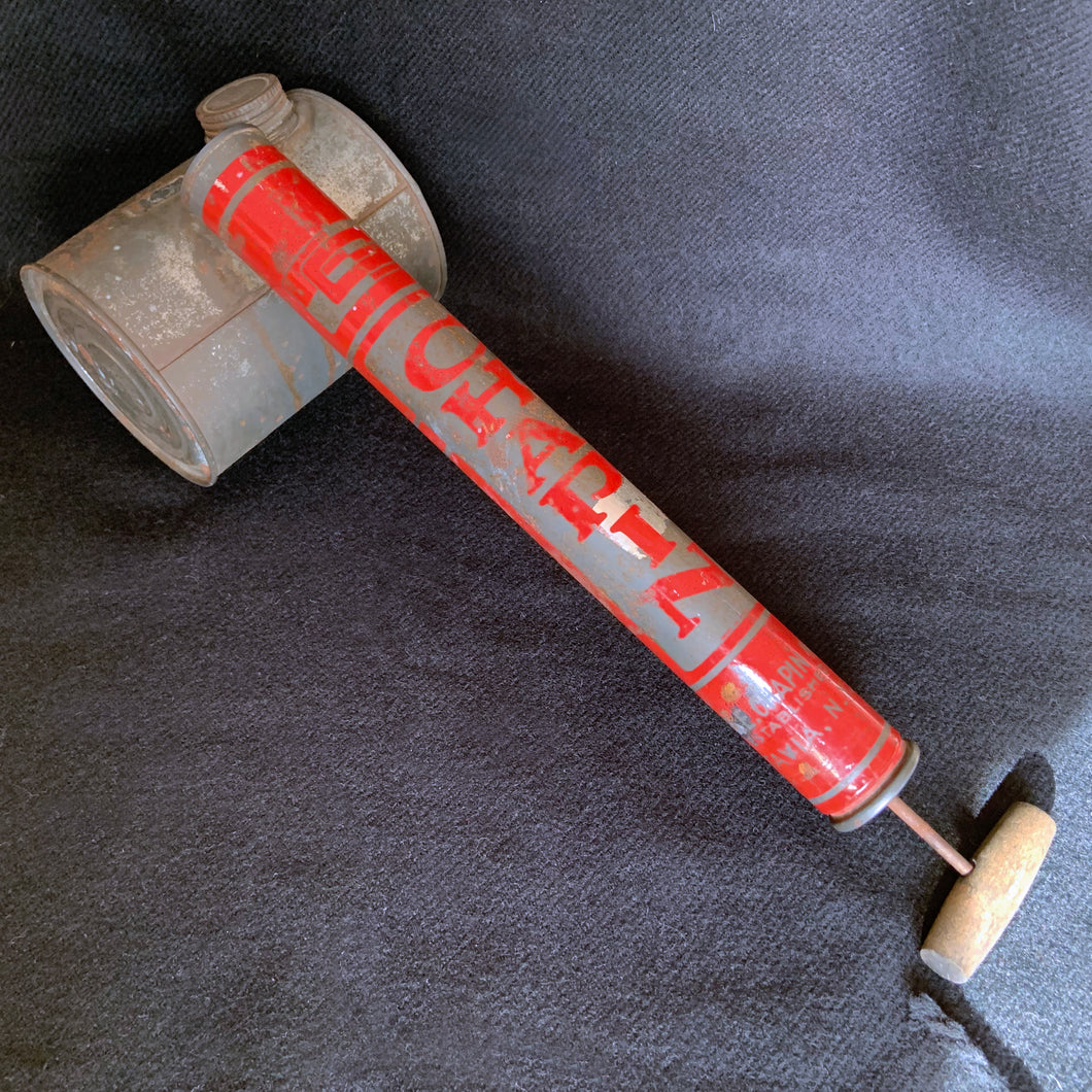 Great graphics and colour on this vintage insect sprayer from the Chapin company.   Operated by a manual hand pump with wood handle and metal barrel for liquid.  Measures 16 inches in length