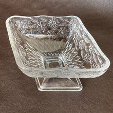 Load image into Gallery viewer, Diamond-shaped footed pedestal compote dish is embellished with pressed glass floral details, a diamond starburst on the bottom of the bowl and a lovely scalloped edge. Crafted by Indiana Glass, 1940s.&nbsp;A sweet piece that will look great in any space.  In excellent condition, free from chips&nbsp;and cracks.  Measures 6 1/2 x 4 1/2 x 3 inches
