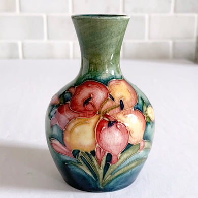 Vintage Moorcroft African Lily Miniature Art Pottery Bud Vase Green Ground Yellow Pink Red Ceramic Slip Technique Hand Painted Shabby Chic Cottage Mid Century Flea Market Style Home Decor Unique Hostess Housewarming Gift Toronto Canada antique shop store community seller reseller vendor