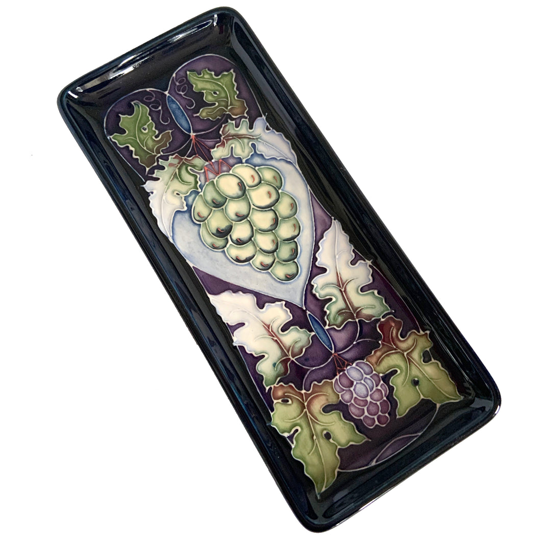 A beautiful hand painted art pottery tray in the 