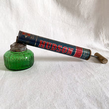 Load image into Gallery viewer, You don&#39;t have to be a gardner to appreciate the fabulous navy &amp; red graphics paired with gorgeous deep green glass (removable) on this vintage garden sprayer. A perfect addition to your vintage decor! Excellent condition and the tube still has compression  should you wish to use it as intended.  Measures 15 inches in length
